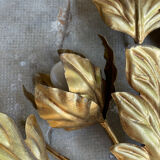 Golden wall lamp foliage