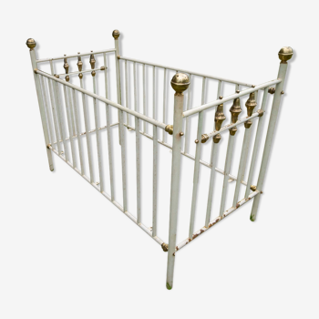 Children's bed made of iron and brass