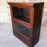 Vintage mahogany avocado bookcase with overhead glass doors circa 40's/50's