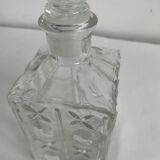 Molded glass carafe, 1960s-1970s, stylized flower decoration, oval, square base, stopper, rosette