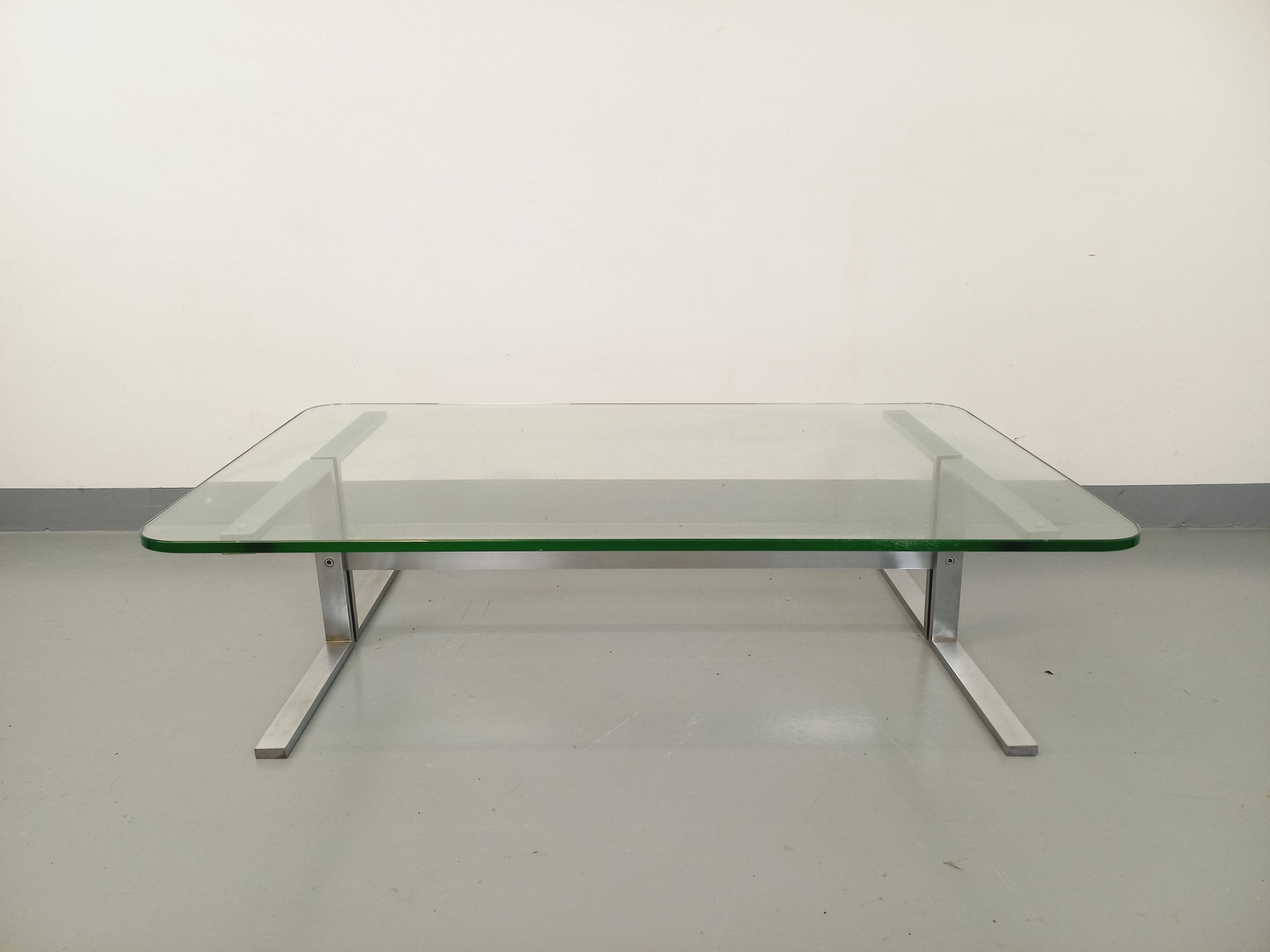 Vintage coffee table in transparent glass and cast aluminum from the 70s