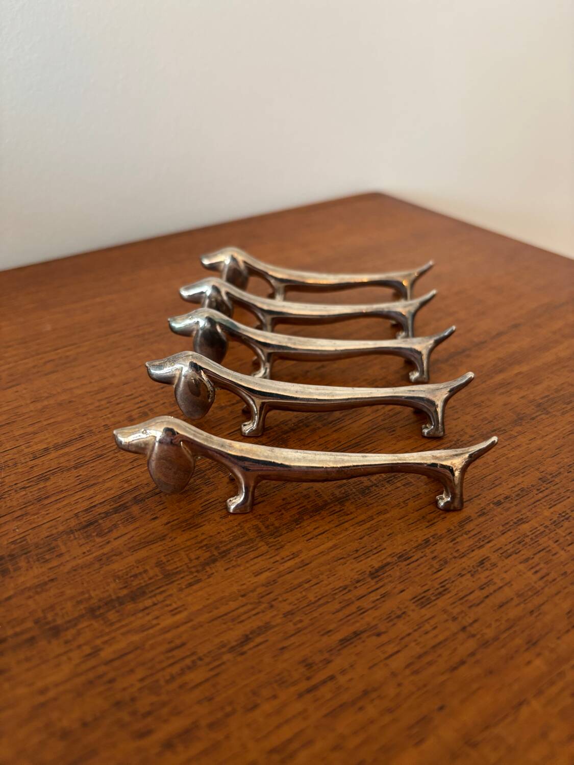 Set of 5 vintage dachshund knife rests – Metal dog knife rests