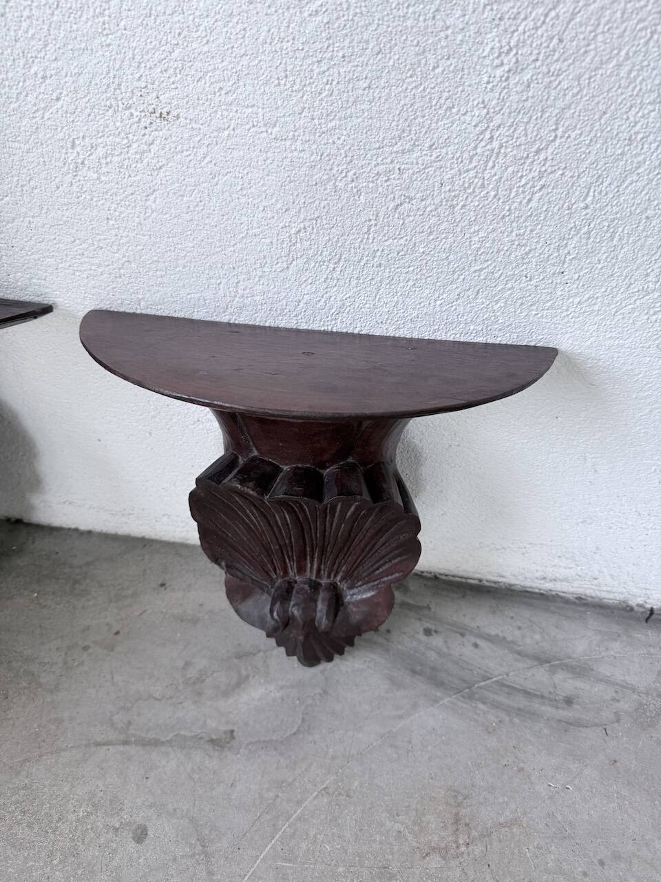 Pair of carved Italian wall consoles