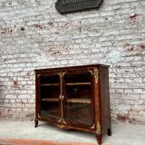 Low showcase in rosewood veneer of the regency xviii th century