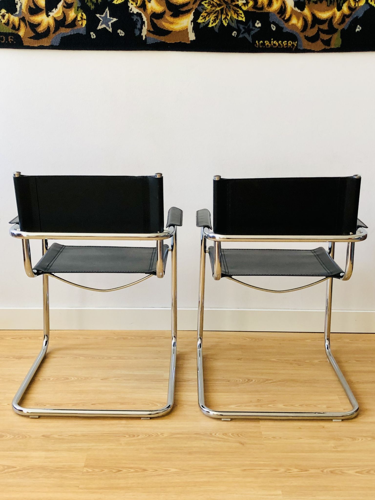 Pair of tubular armchairs in metal and leather Style Marcel Breuer