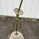 Antique brass chandelier with 3 lights and frosted glass shades.