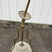 Antique brass chandelier with 3 lights and frosted glass shades.