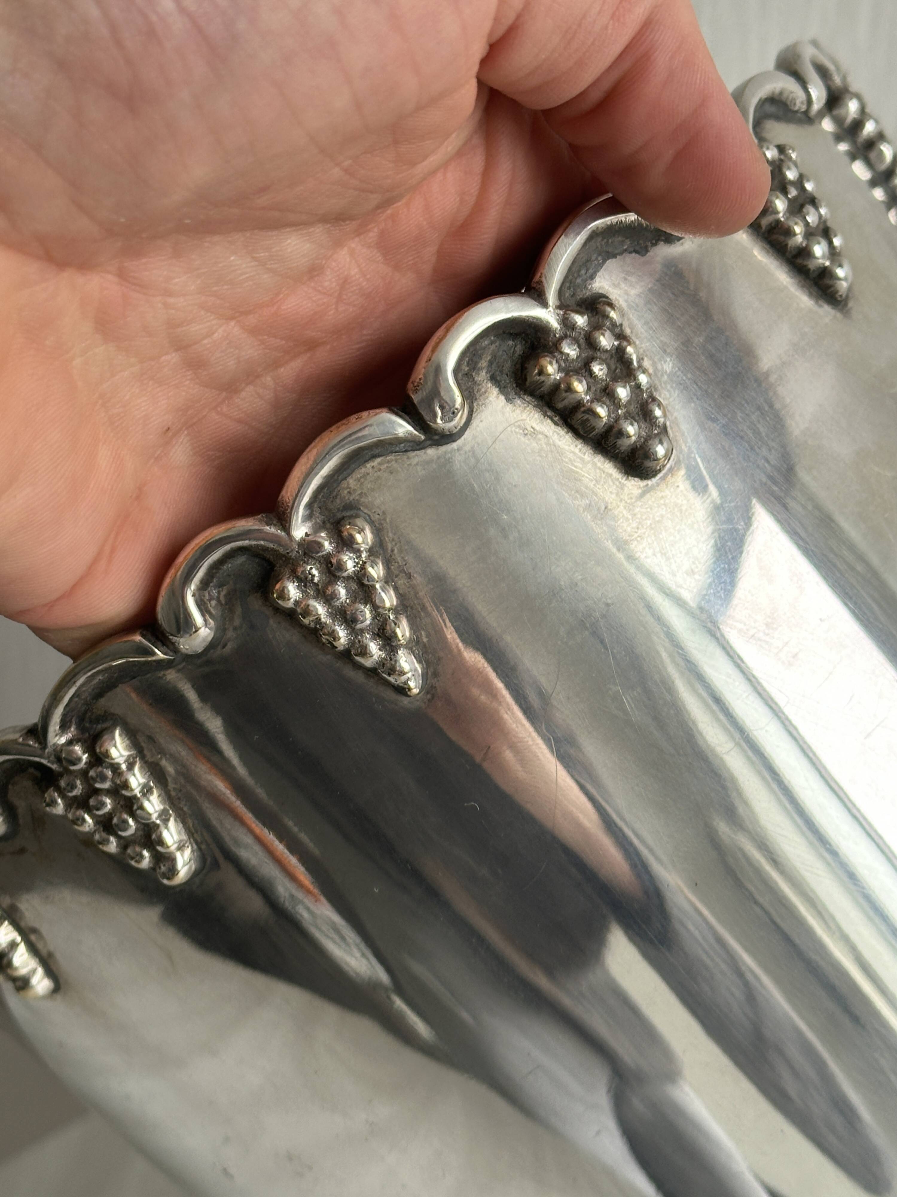 Antique champagne bucket in shiny silver metal