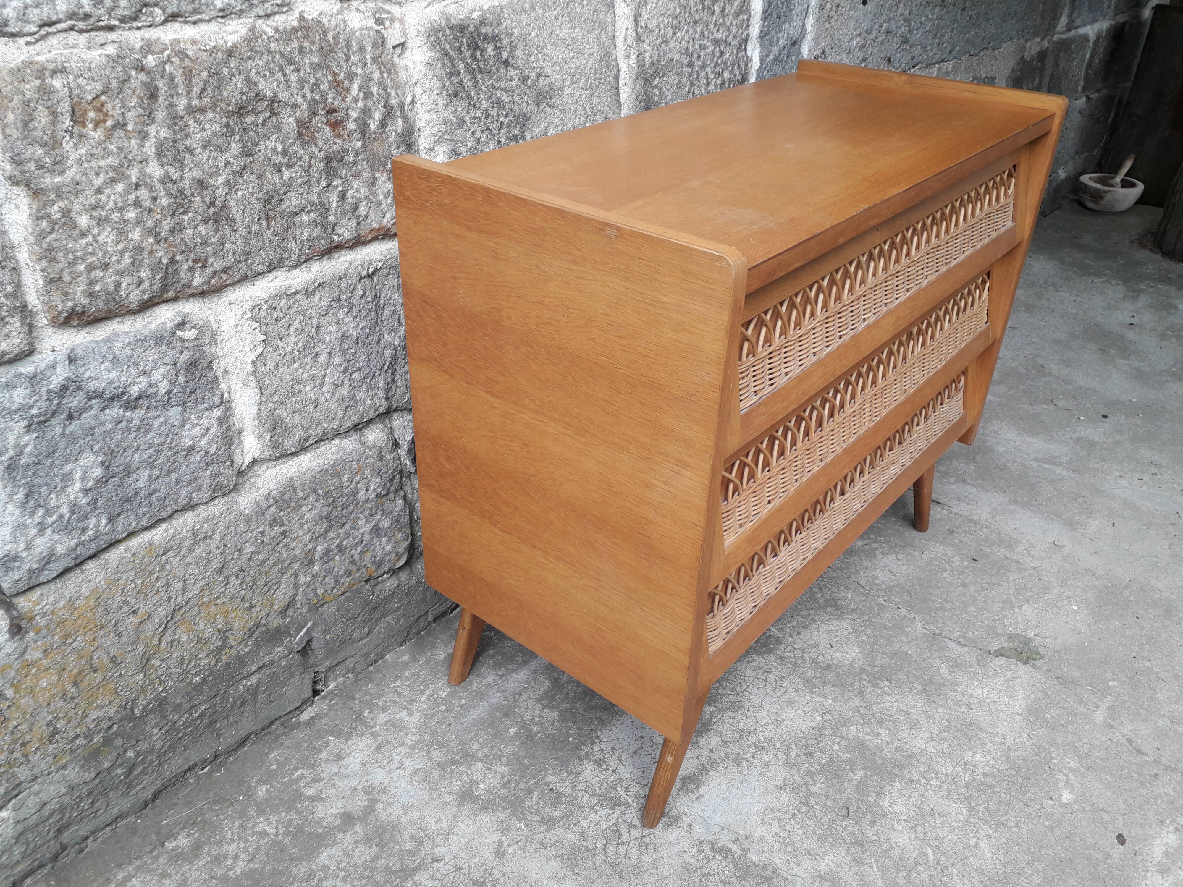 Vintage chest of drawers in rattan compass feet