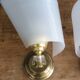 Golden metal appliques and plexiglass perspex in the style of Maison Lunel or Guariche.