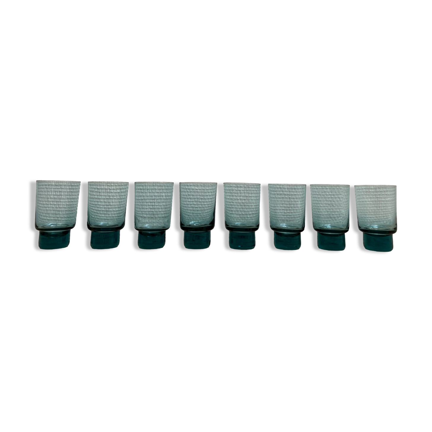 Eight bluish glass water glasses