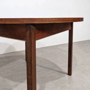 Extendable round rosewood dining table