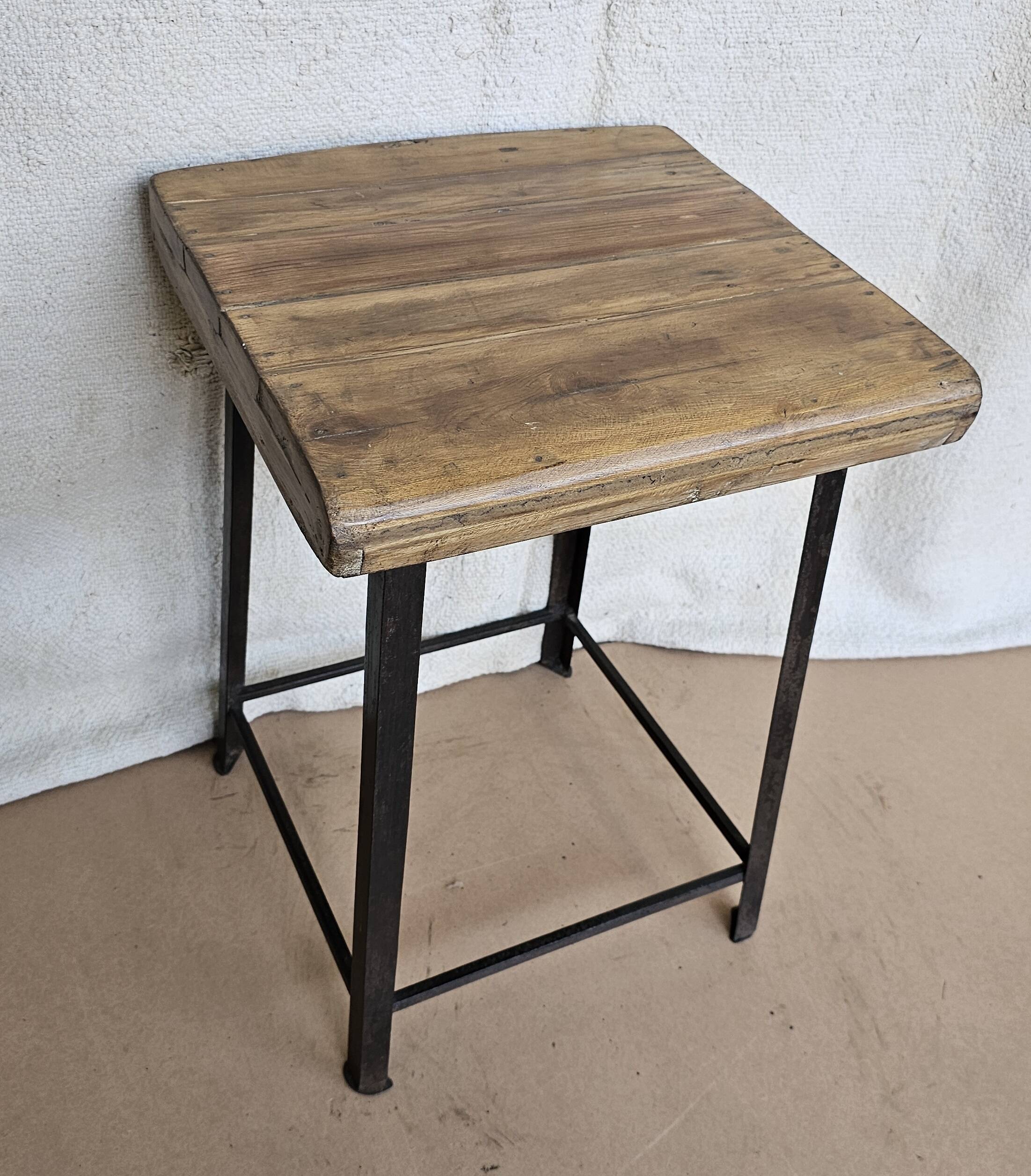 Old workshop stool in wood + wrought iron