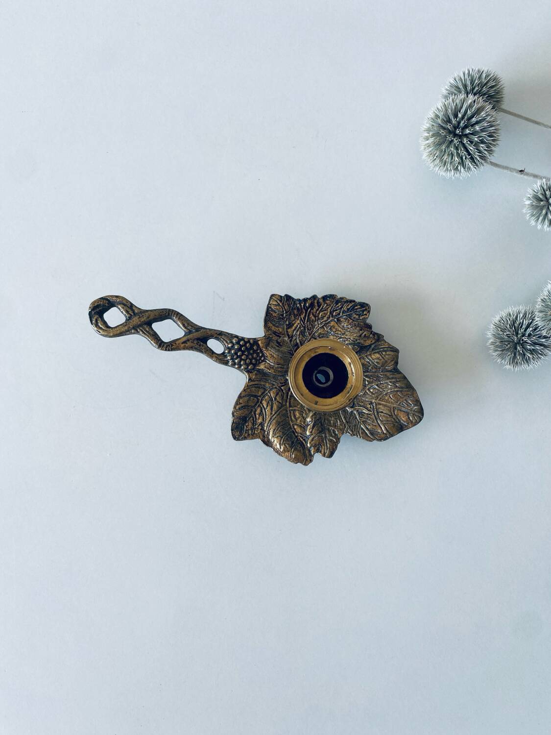 Cellar rat candle holder