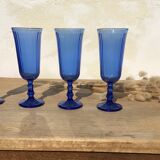 Champagne flutes in blue glass