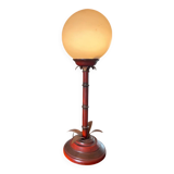 3. Art Deco palm tree lamp – red base & white glass globe
