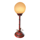 3. Lampe Art Déco palmier – pied rouge & globe en verre blanc