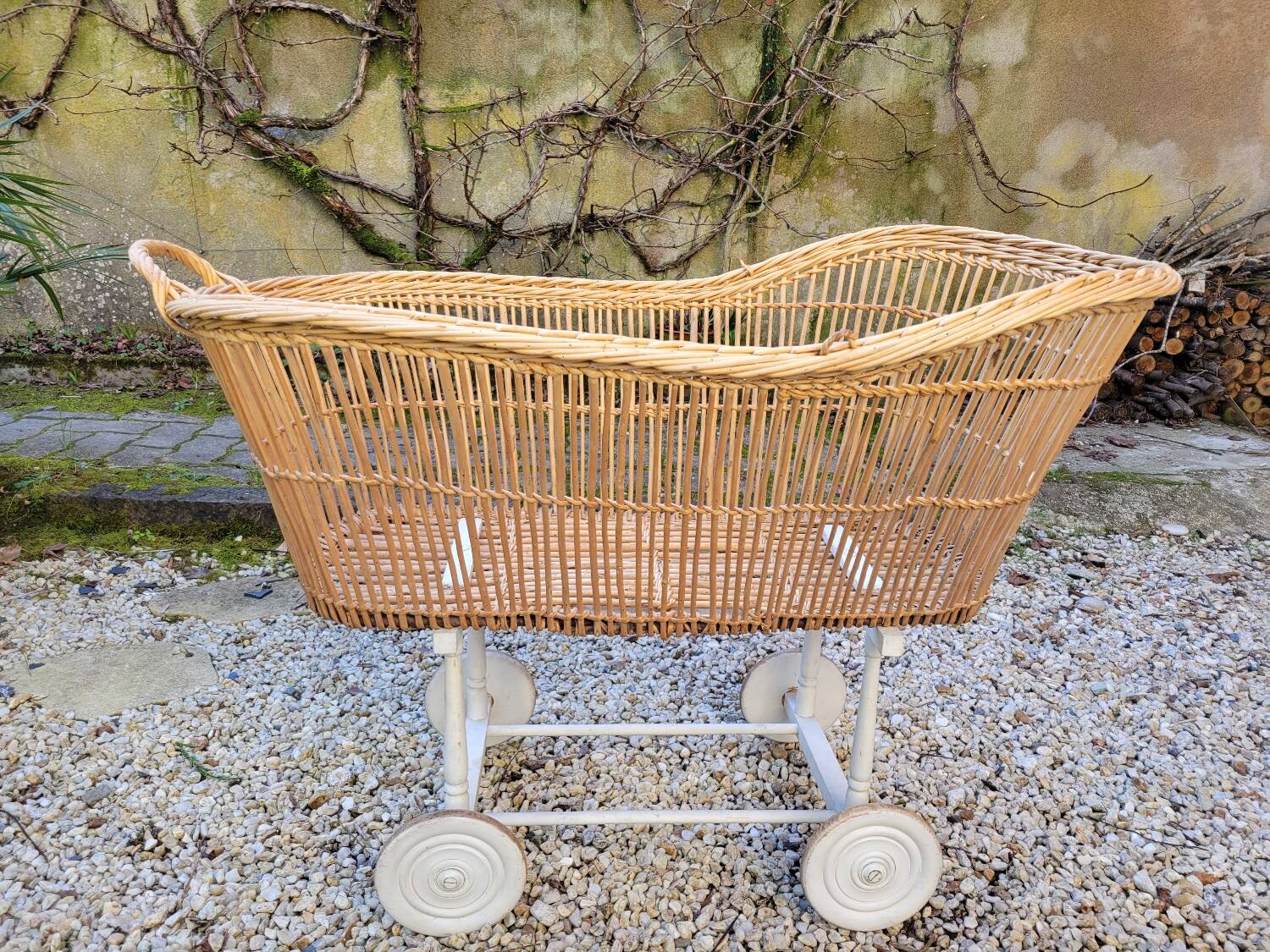 Wicker cradle on wheels, late 19th century