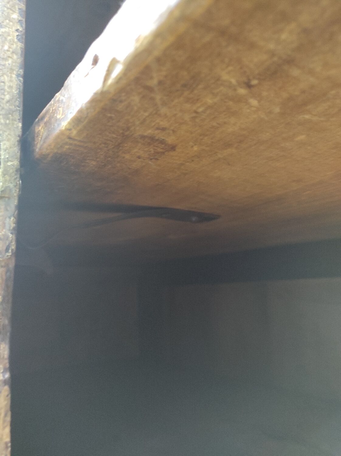 Old rustic Parisian wardrobe patinated white in oak and fir