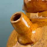 Old terracotta gargoulette jug