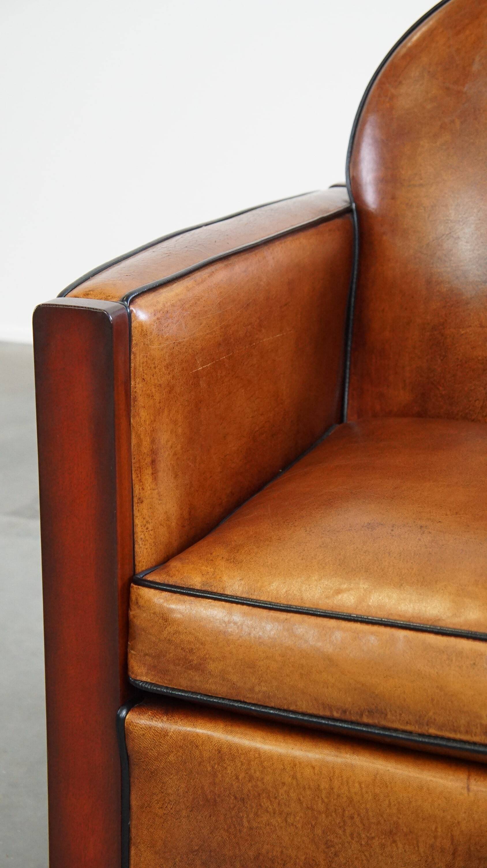 Cognac-colored sheepskin Art Deco design armchair in good condition
