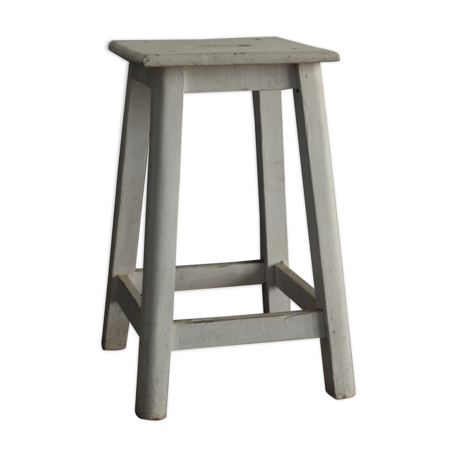 Old white wooden handle stool