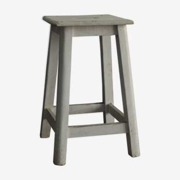 Old white wooden handle stool