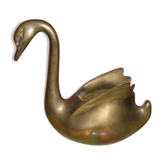 Empty brass swan pocket