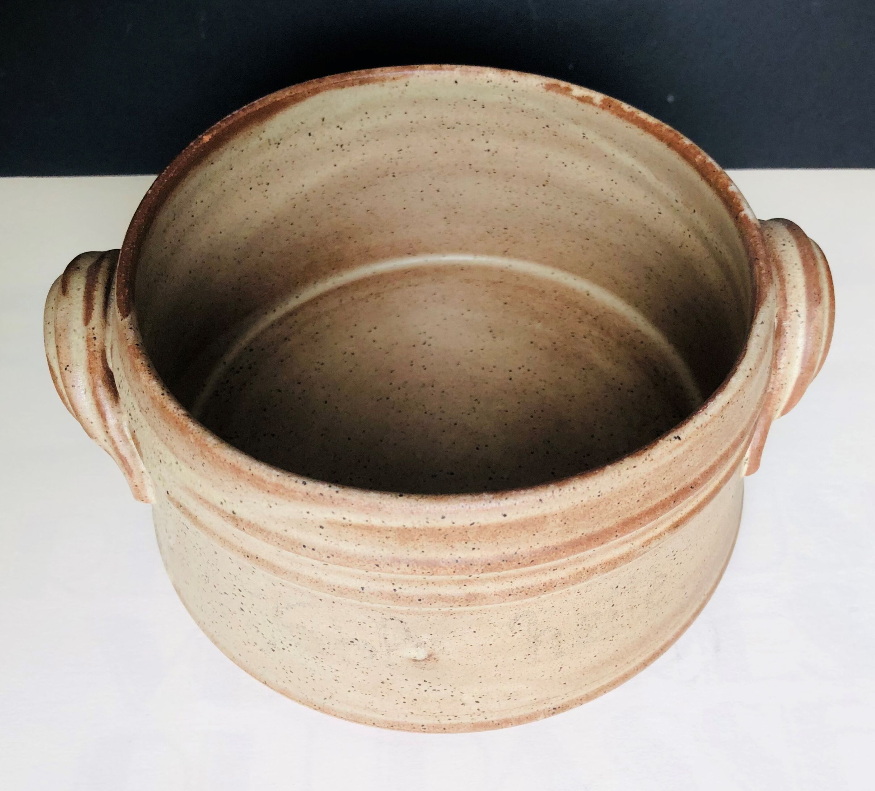 Covered terracotta pot