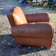 Fauteuil club des années 30 en simili cuir