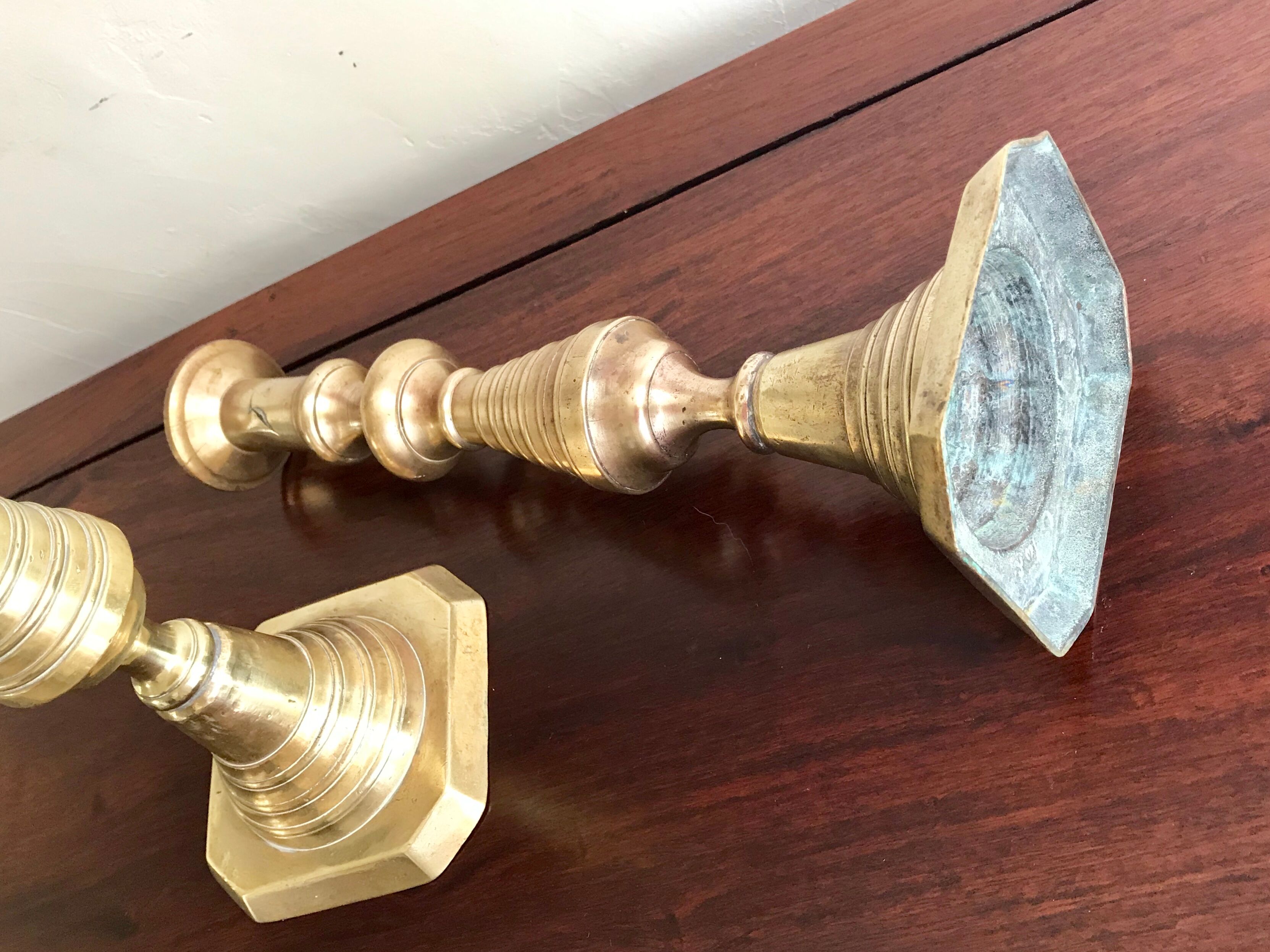 Pair of old brass candlesticks