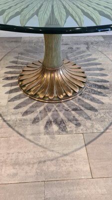 Round carved wooden dining table, Italy