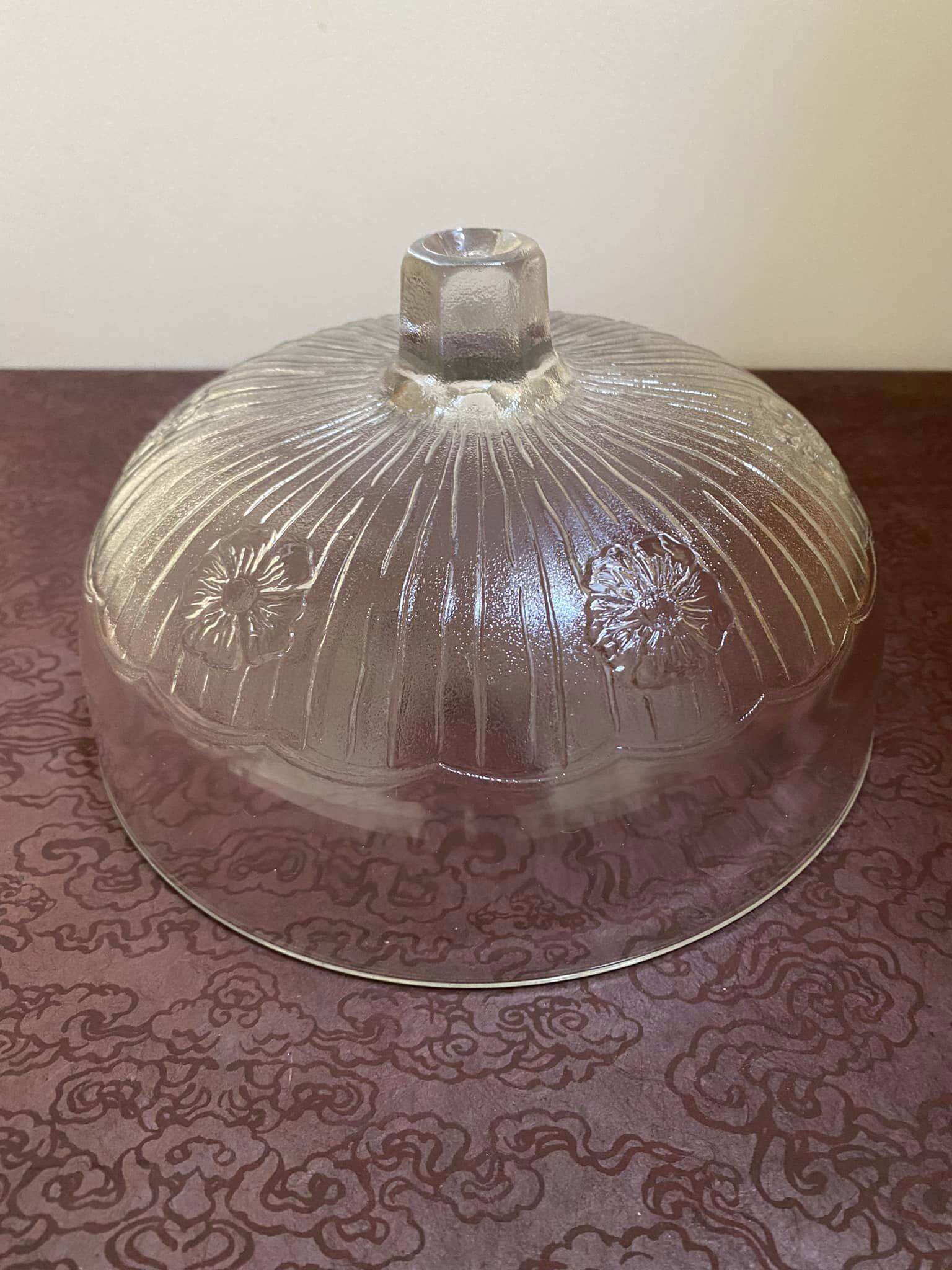 White glass bell. Floral patterns.