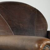 Characterful sheepskin design armchair with beautiful patina