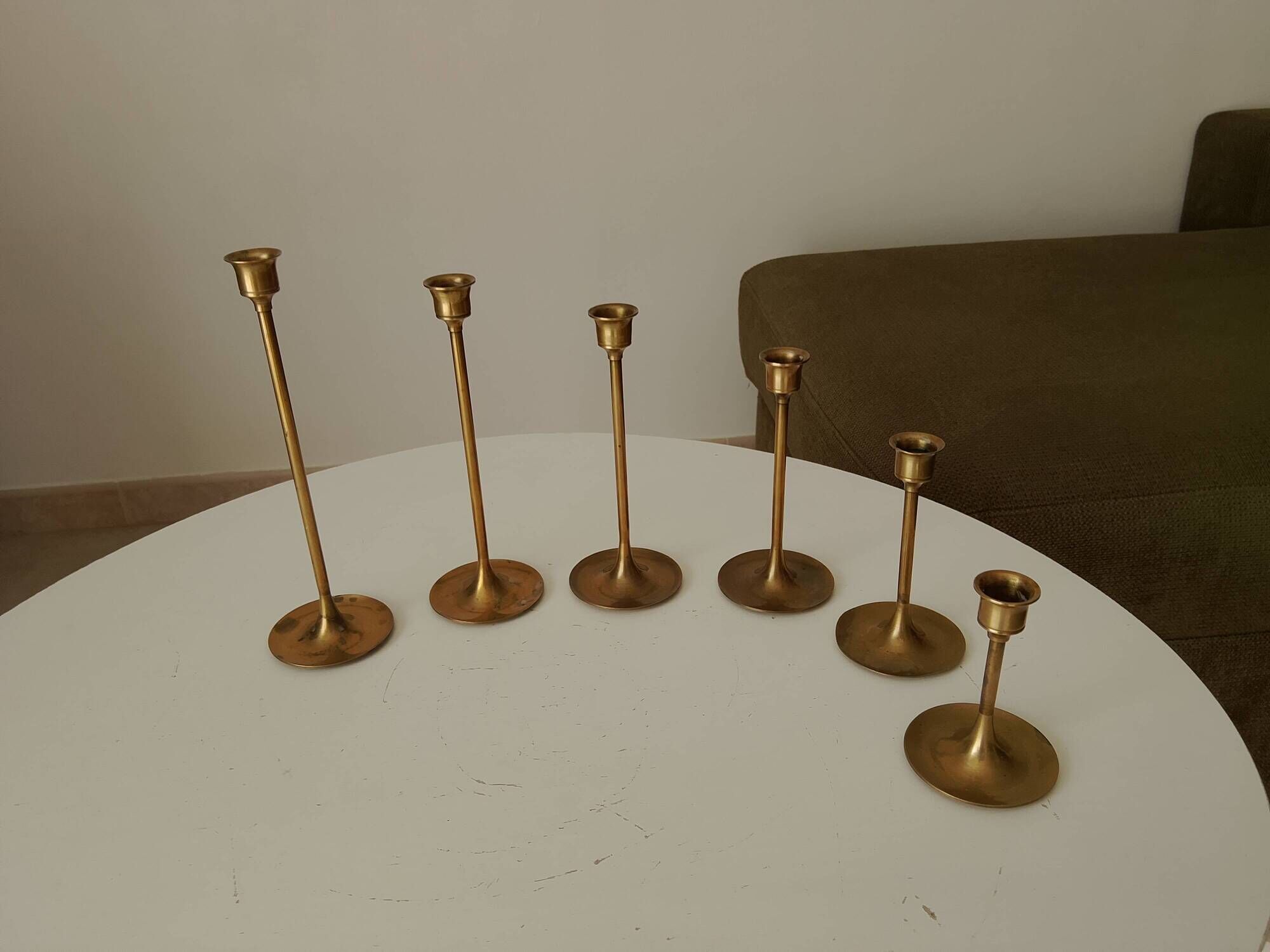 Set of 6 Scandinavian brass candle holders from the 1960s.