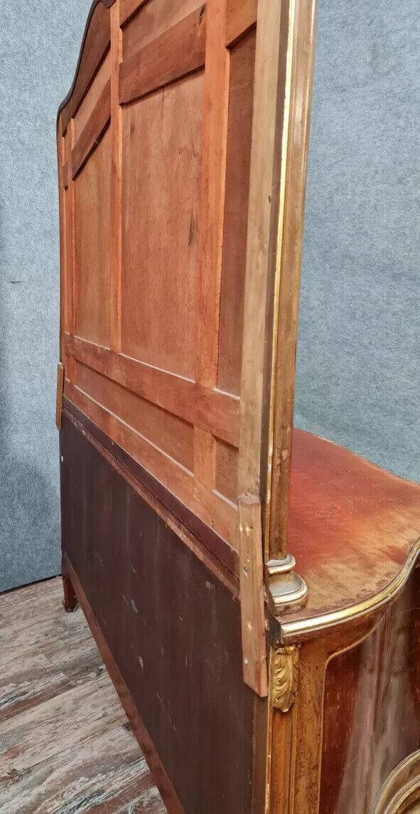 Japanese-style curved door chest of drawers in mahogany and gilded wood sold with its psyche mirror