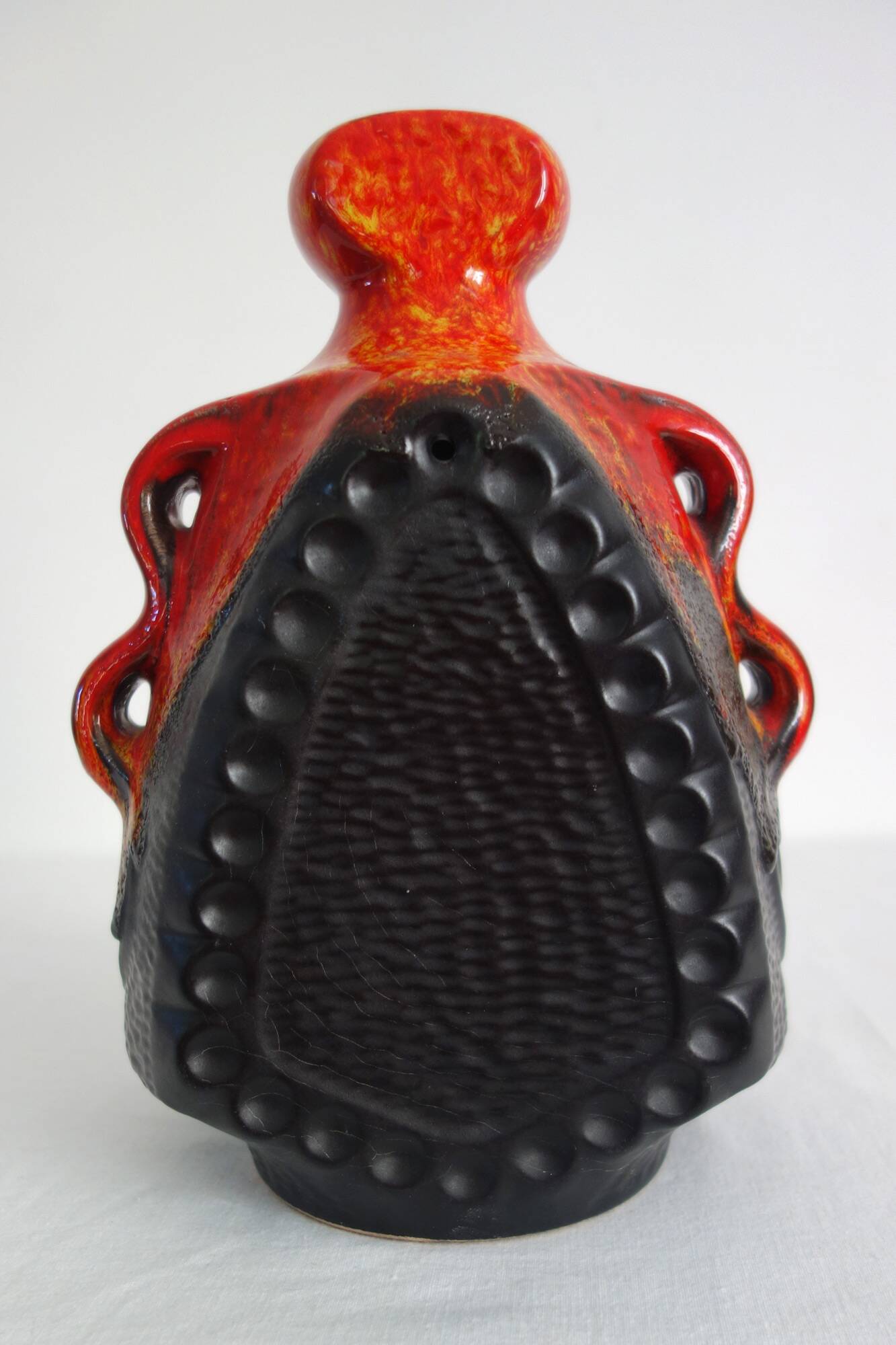 Bay Keramik orange-red and black candle holder from the 70s