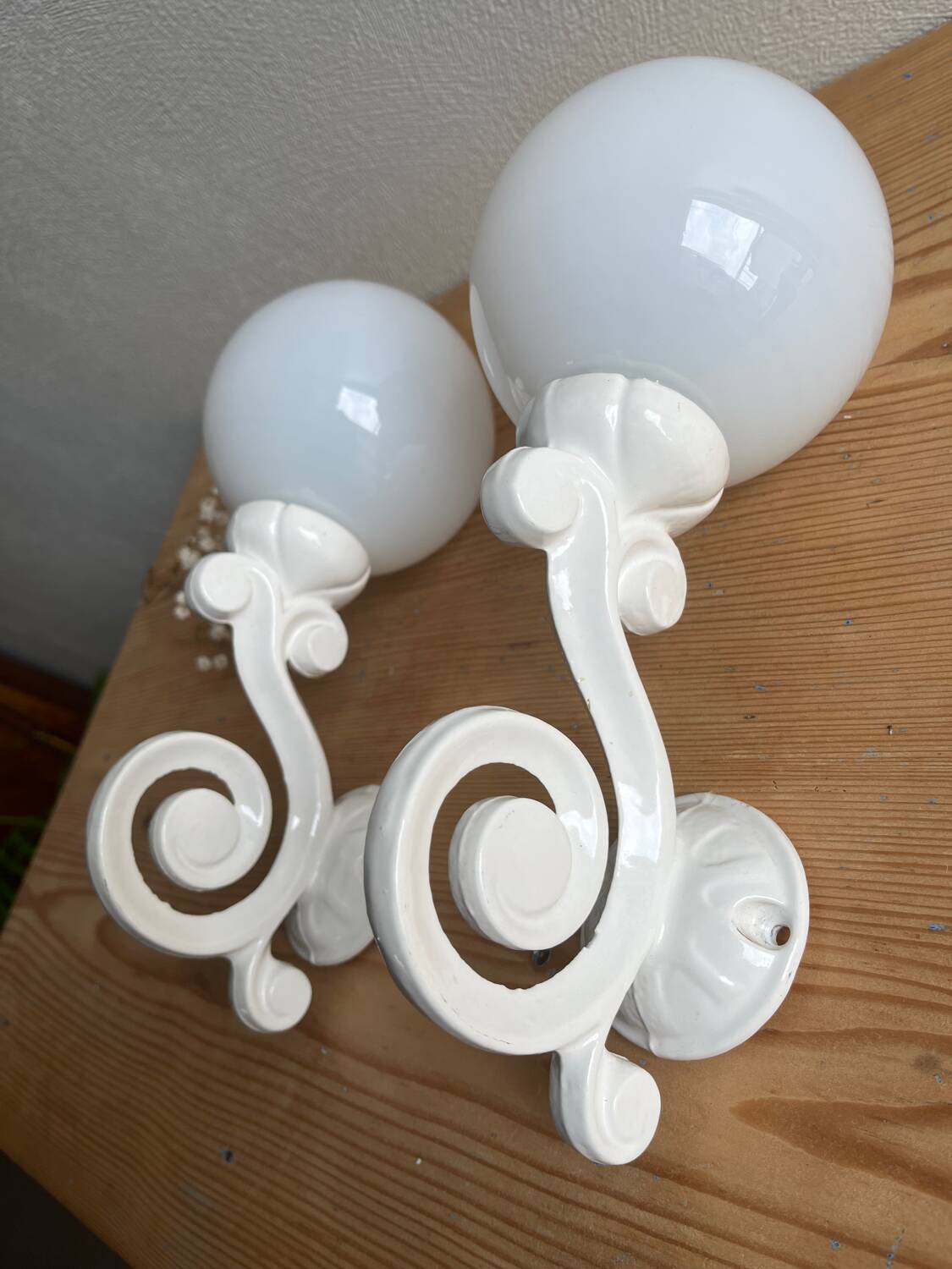 Antique enamelled cast iron wall lights / opaline globe