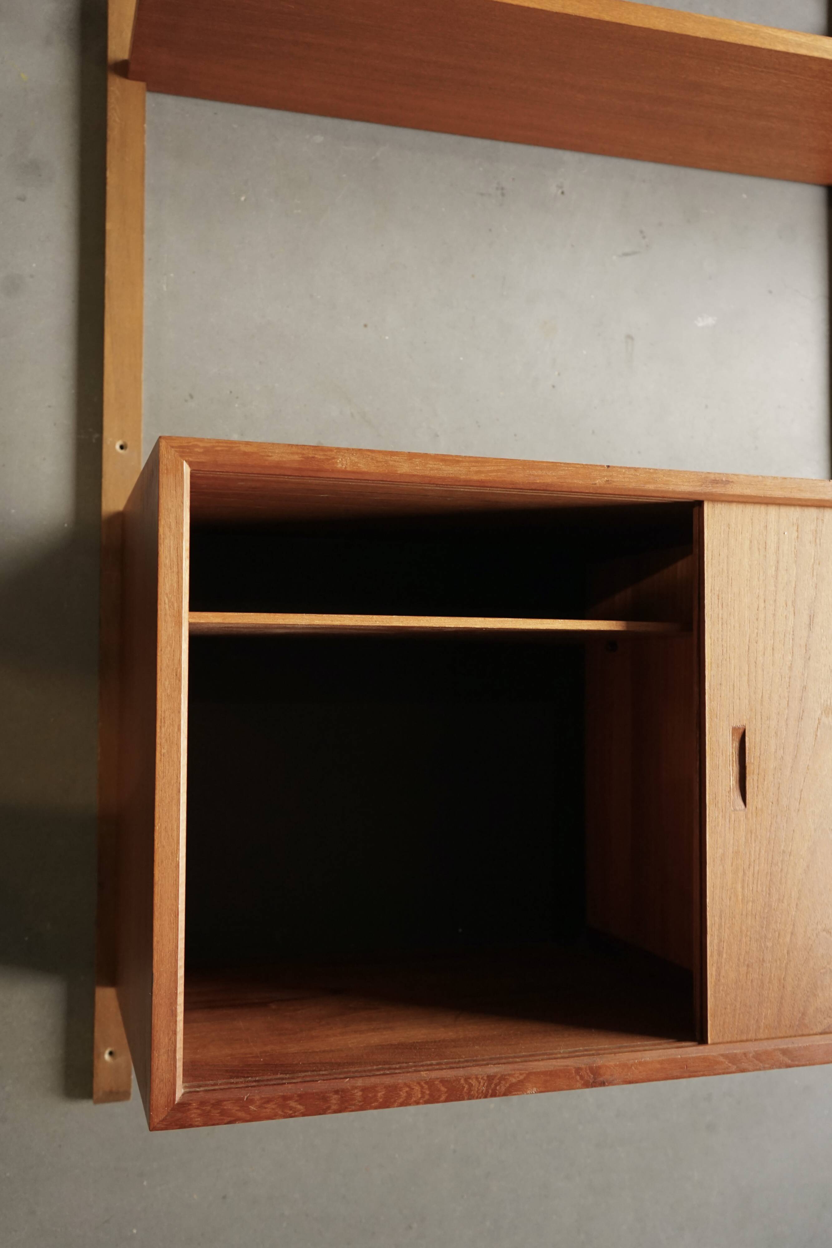 Meuble mural en teck danois du milieu du siècle par Poul Cadovius pour Cado