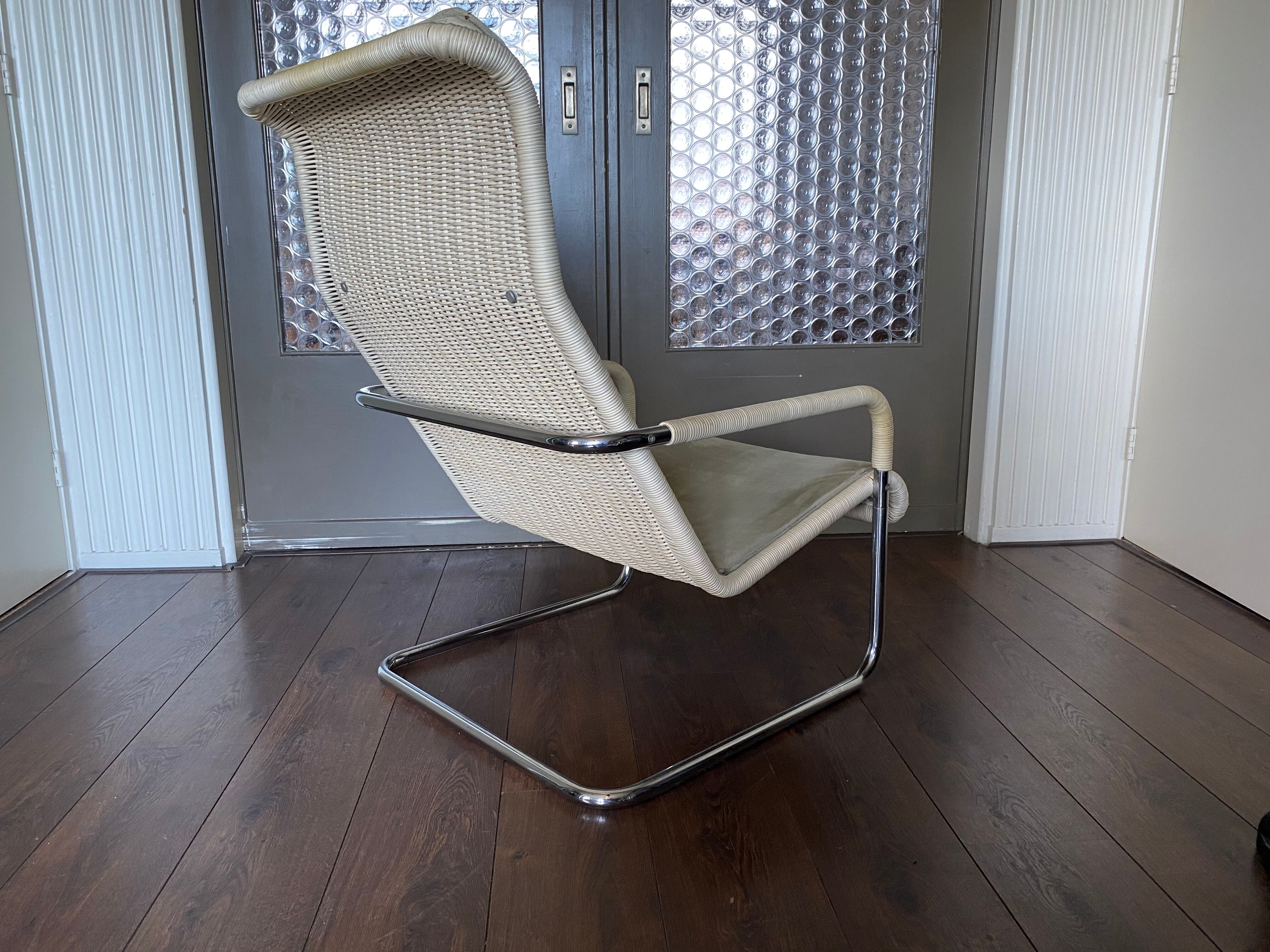 Vintage modernist chromed tubular steel, rattan & leather easy chair