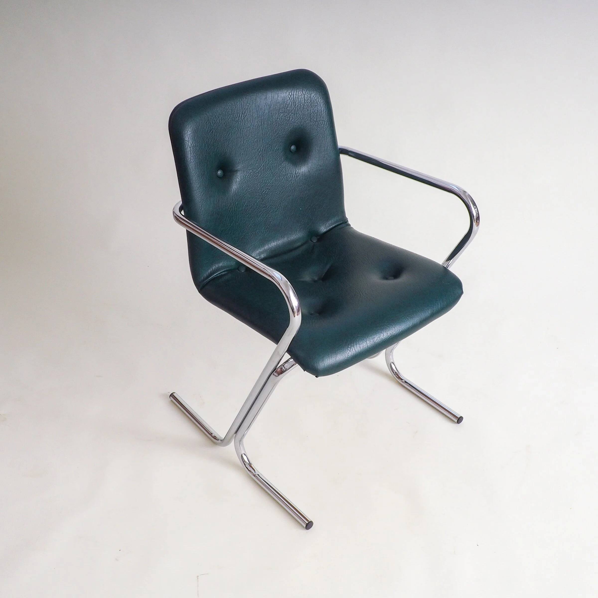 70s tubular arm chair by Tavo
