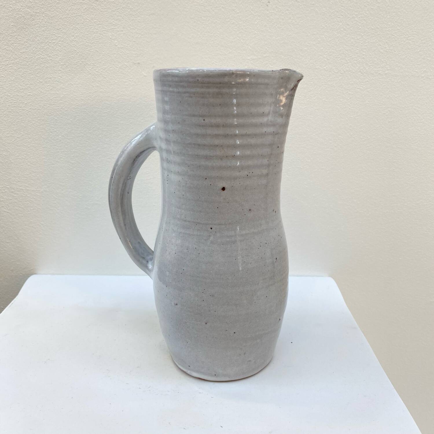 Enameled stoneware pitcher by Jeanne and Norbert Pierlot