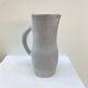 Enameled stoneware pitcher by Jeanne and Norbert Pierlot