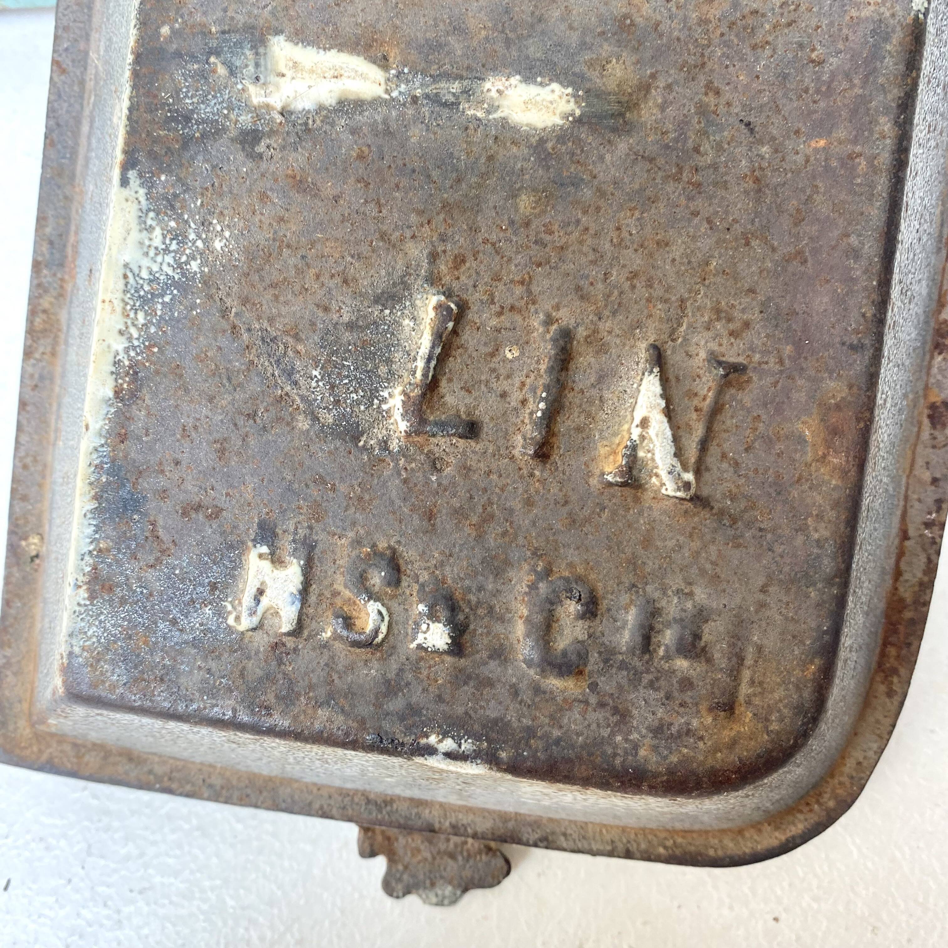 Enameled cast iron umbrella stand from the early 20th century