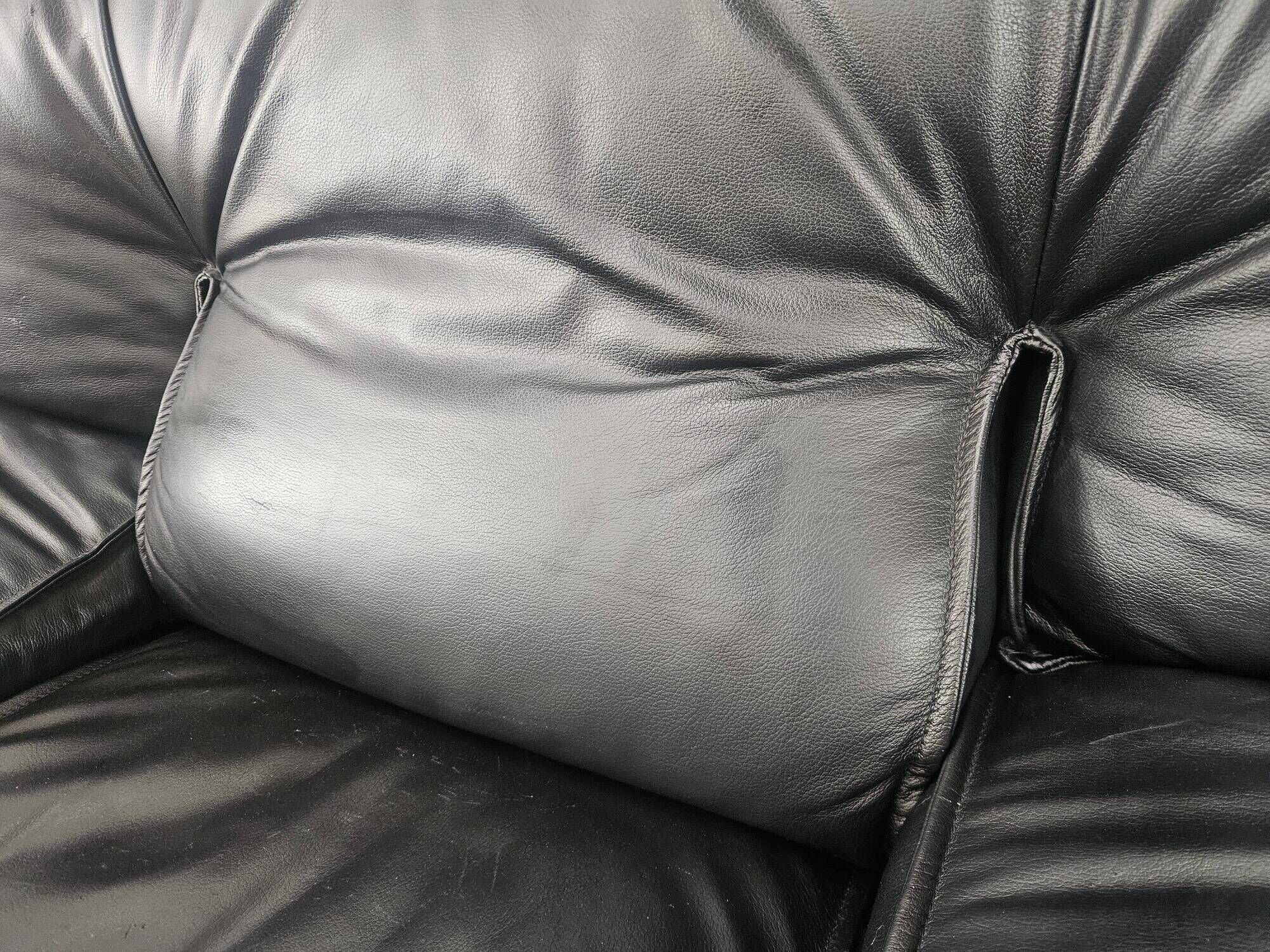 Red and black leather armchair by Nicoletti Salotti