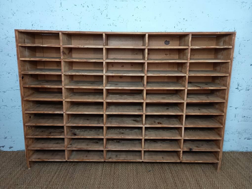 Wooden sorting cabinet with 50 compartments.