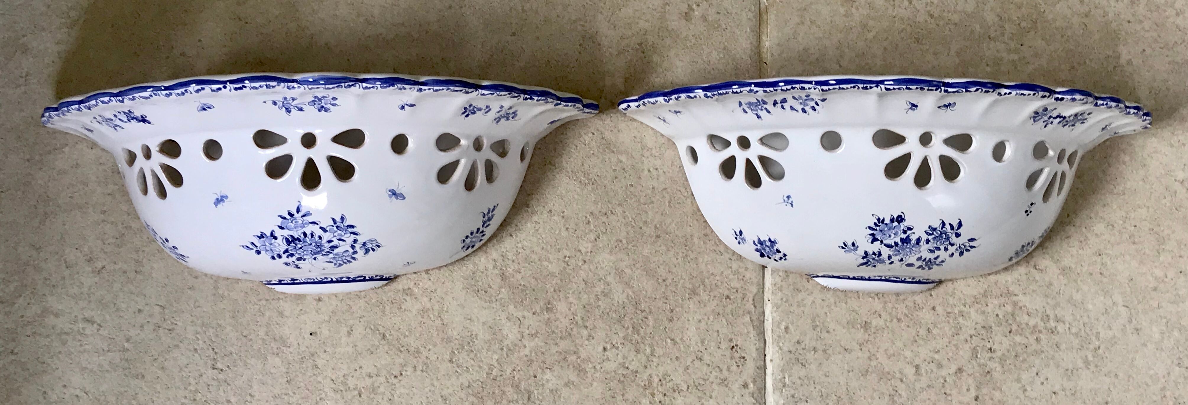 Pair of ceramic moustiers sconces