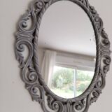 Louis XVI style patinated oval mirror