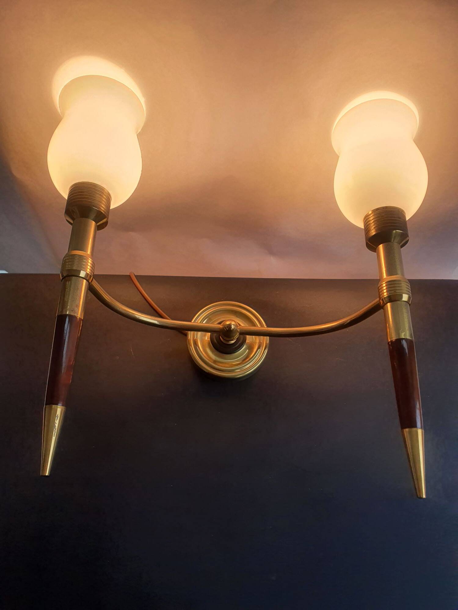 Pair of large torch-style wall sconces from the 1950s