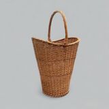 Old woven wicker umbrella stand